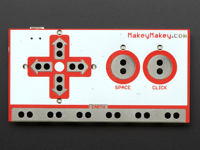 Front of PCB that looks like a game controller with holes in it