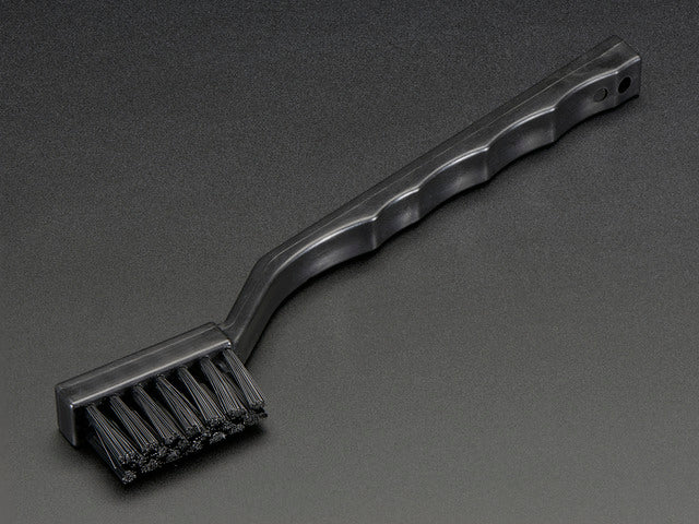 Black toothbrush-looking brush