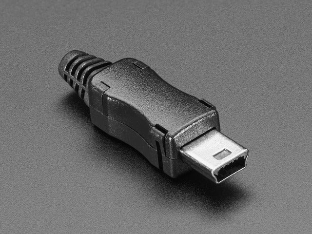 Angled shot of an assembled USB DIY Connector Shell with a Type Mini-B Plug. The male plug faces the camera at an angle.