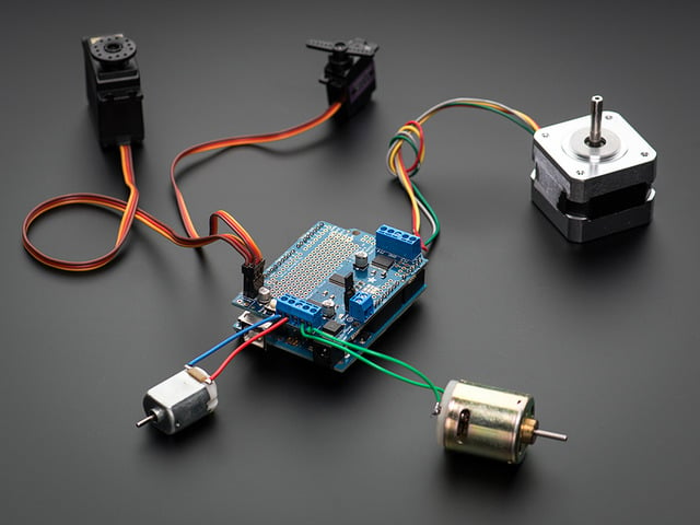 Servo Shield for Arduino v2 Kit connected to several different steppers and servos. 