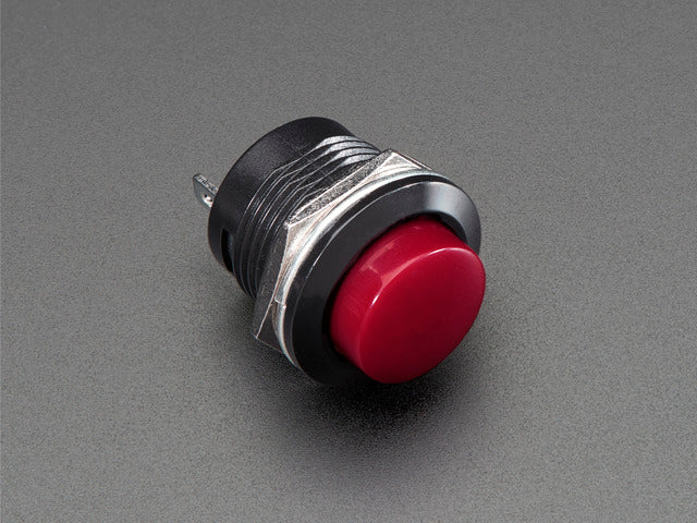 Angled shot of 16mm burgundy panel mount pushbutton.