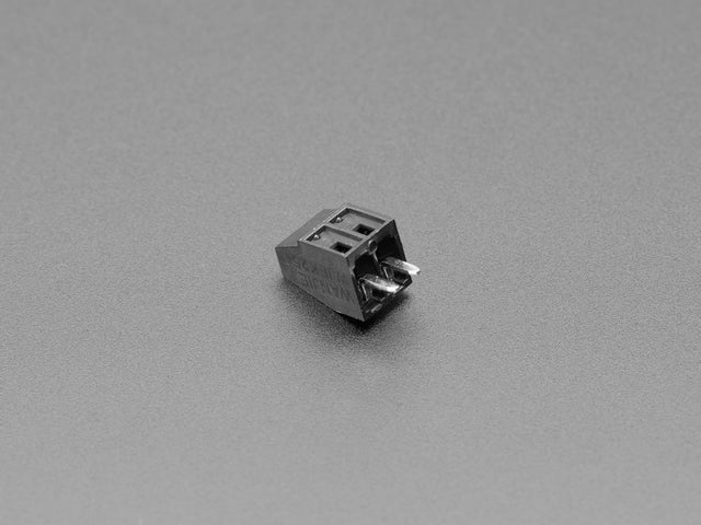 Angled shot of black 2-pin 2.54mm terminal block.