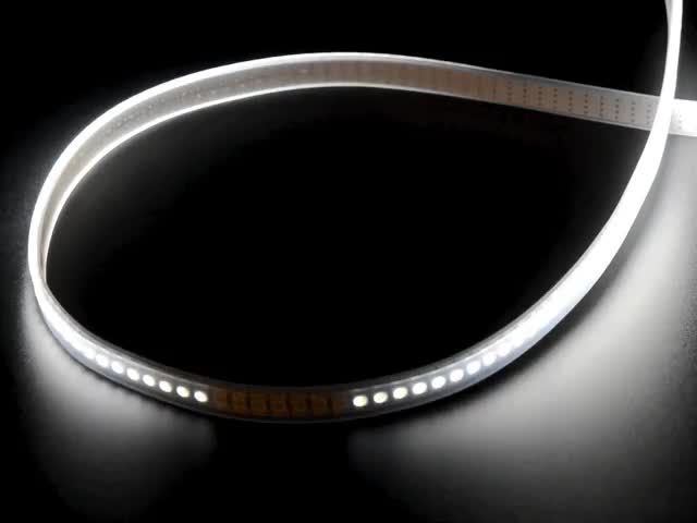 Video of part of an LED strip glowing cool white LEDs.