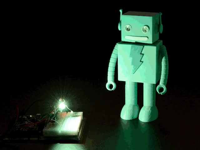 Very bright LED bathing robot figuring in rainbow light