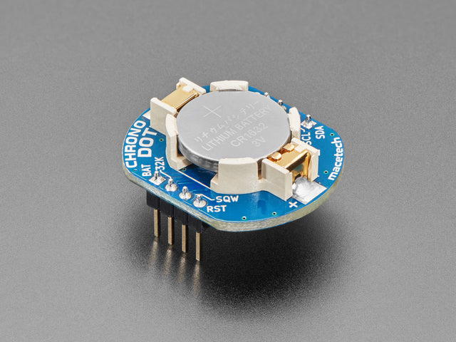 Angled shot of a ChronoDot - Ultra-precise Real Time Clock with a cell battery inserted. 