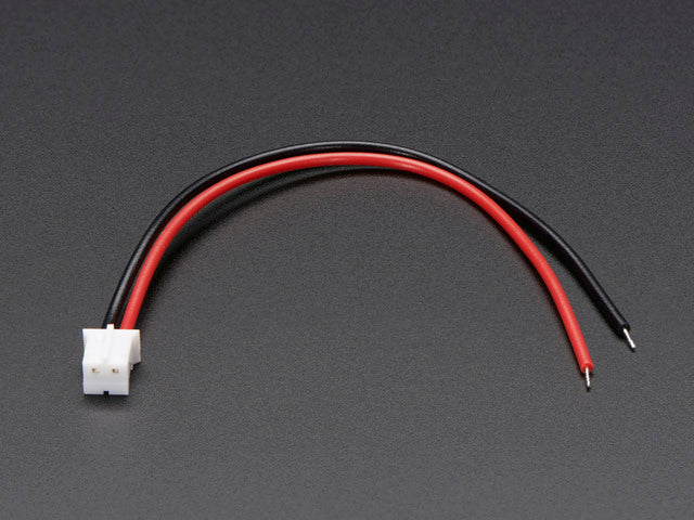 Top view shot of a red and black JST PH 2-Pin Cable to Female Connector - 100mm.