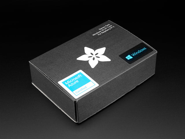 Angled shot of a black box with the white Adafruit star-flower logo.