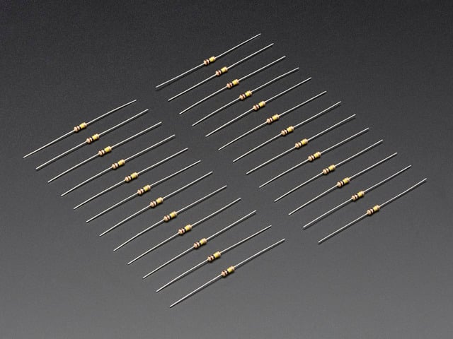 Angled shot of 25 Through-Hole Resistors - 100K ohm 5% 1/4W.