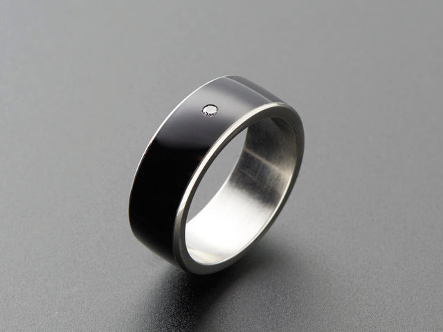 Black resin and metal ring