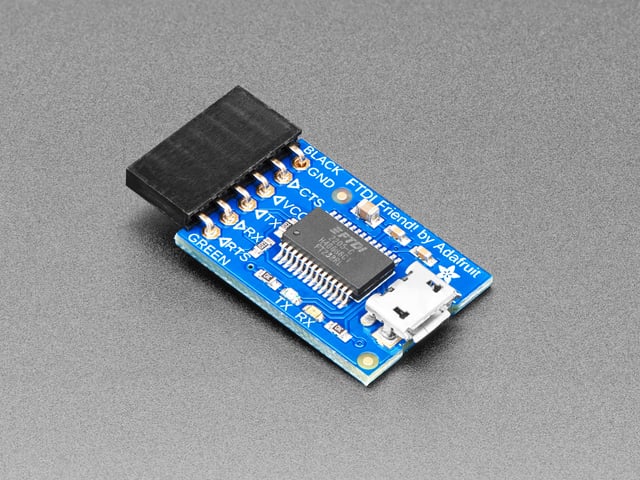 Angled shot of blue rectangular FTDI breakout board.