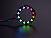 NeoPixel Ring with 12 x 5050 RGBW LEDs lighting up rainbow and white