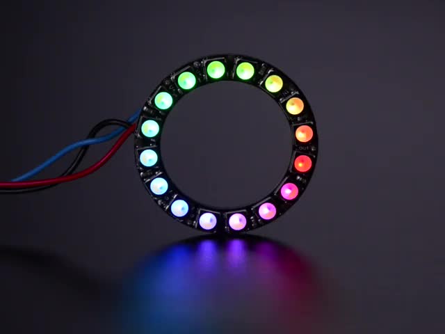 NeoPixel Ring with 16 x 5050 RGBW LEDs lighting up rainbow and white