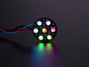 NeoPixel Jewel - 7 x 5050 RGB LED wired to Trinket, lit up rainbow and white