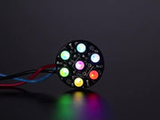 NeoPixel Jewel - 7 x 5050 RGB LED wired to Trinket, lit up rainbow and white