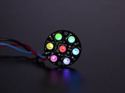 NeoPixel Jewel - 7 x 5050 RGB LED wired to Trinket, lit up rainbow and white