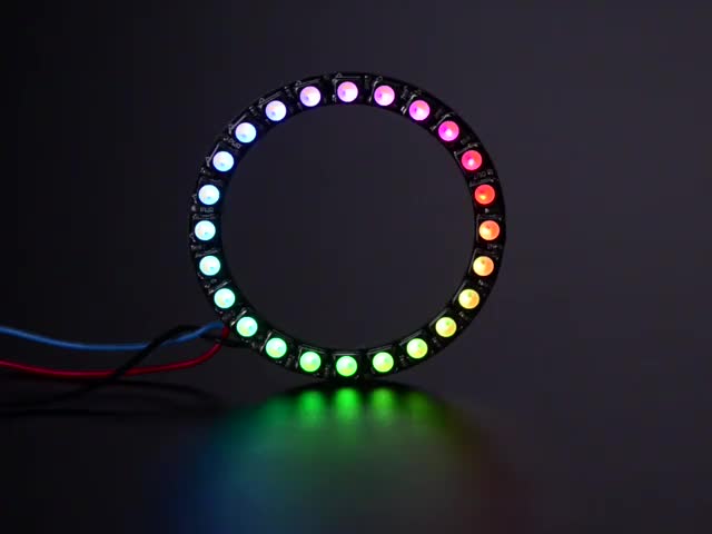 NeoPixel Ring with 24 x 5050 RGBW LEDs lighting up rainbow and white