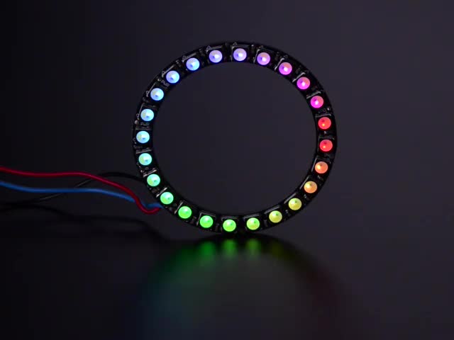 NeoPixel Ring with 24 x 5050 RGBW LEDs lighting up rainbow and white