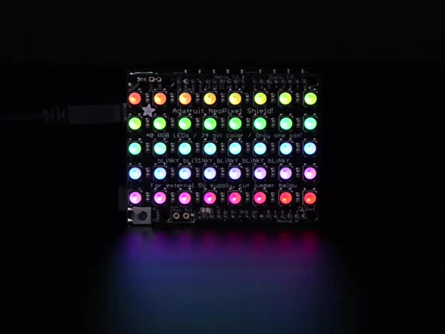 Adafruit NeoPixel Shield for Arduino - 40 RGB LED Pixel Matrix lit up rainbow and white