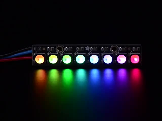 NeoPixel Stick with 8 x 5050 RGBW LED lit up rainbow and white