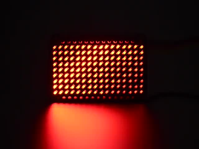 Assembled and powered matrix board emitting red LEDs