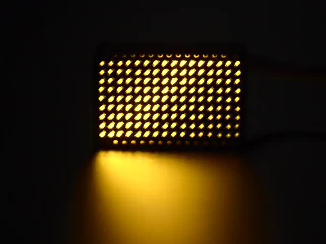 Assembled and powered matrix board emitting Yellow LEDs