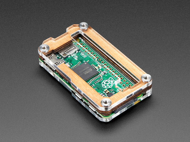 Angled shot of a Pi Zero in a C4Labs Zebra Zero protector.