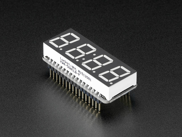 Angled shot of a rectangular shaped 7-segment breakout board with an LED matrix soldered on.