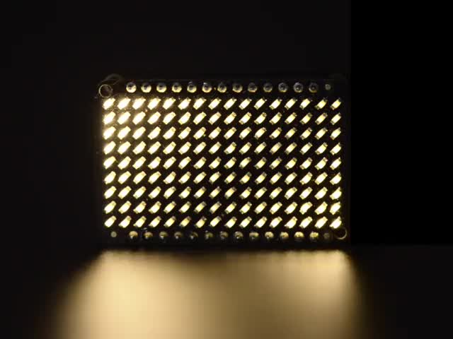 Assembled and powered matrix board emitting warm White LEDs