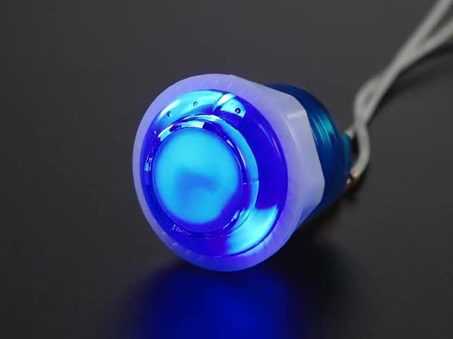 Video of 24mm mini translucent blue LED arcade button flashing on and off.