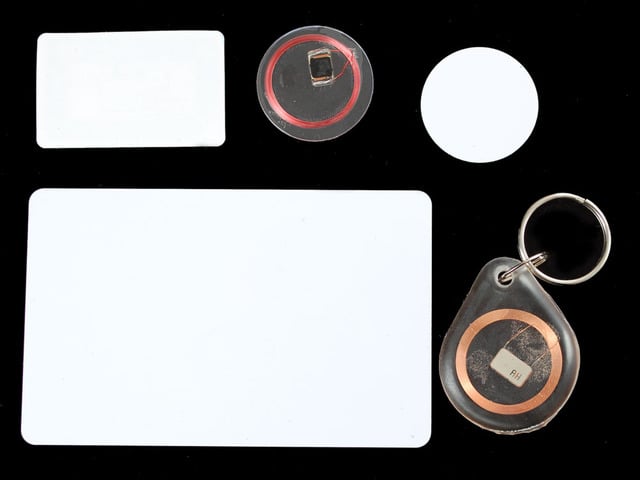 Assortment of discs, cards and stickers with RFID copper coils inside