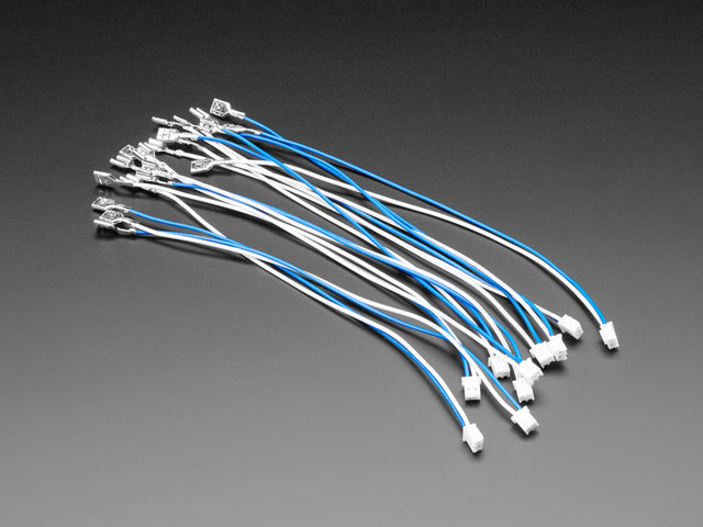 Angled shot of ten ~8.5" long quick-connect wire pairs in white and blue. 