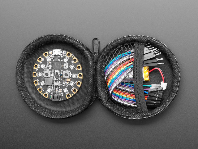 opened Round Black Zipper Case with circuit playground and components 