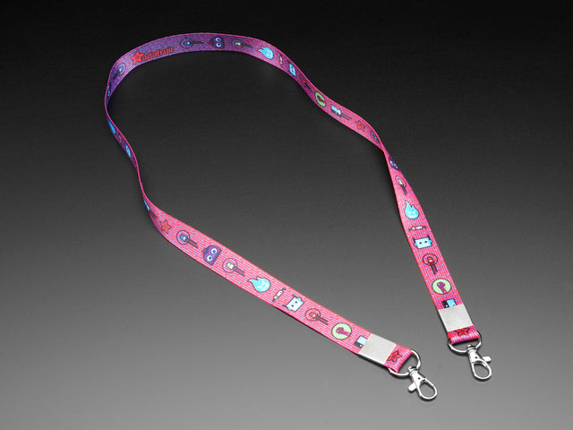 Pink lanyard with Adafruit characters and metal hooks at ends
