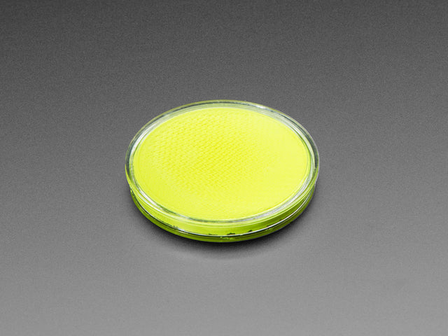 round yellow disc of fluorescent paint.