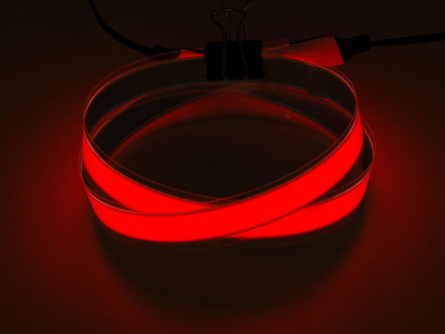 Coil of lit red Electroluminescent Tape Strip 