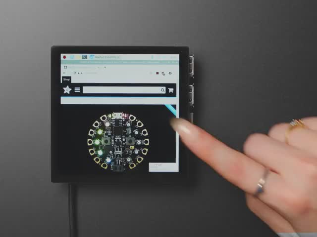 White finger scrolling through the adafruit website on a Pimoroni HyperPixel 4.0 Square - Touch Display for Raspberry Pi - Capacitive Touch - PIM470. 