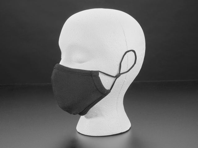 Black cloth face mask shown on a mannequin