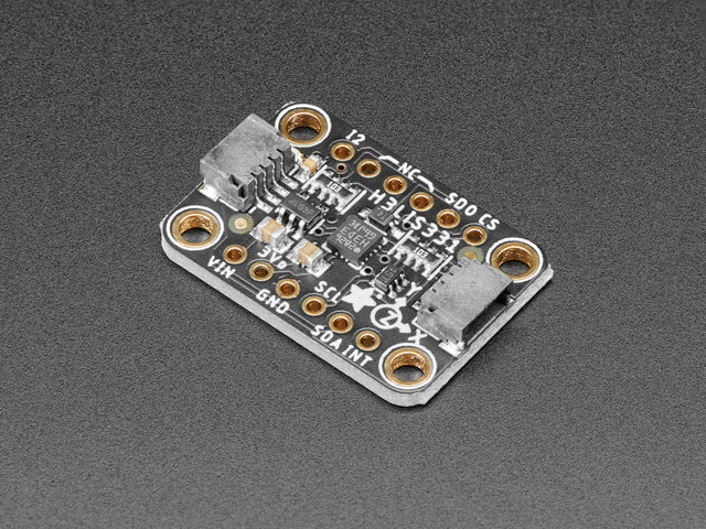 Angled shot of a Adafruit H3LIS331 Ultra High Range Triple-Axis Accelerometer.