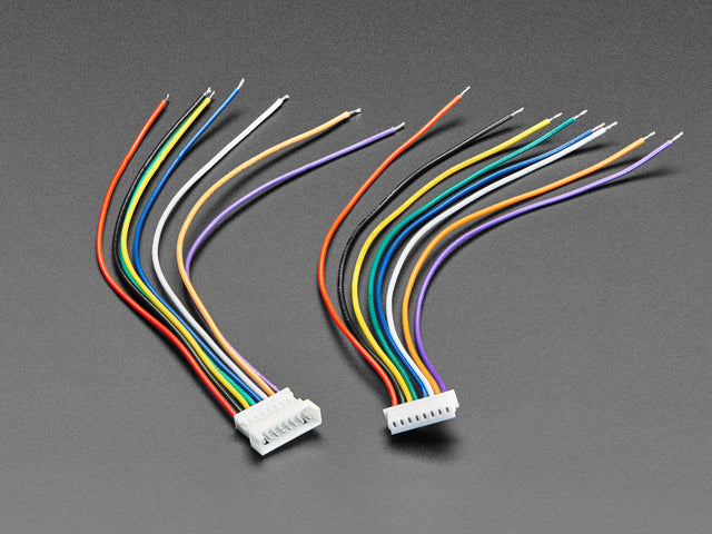 Angled shot of two matching 8-pin 1.25mm pitch cable assemblies.