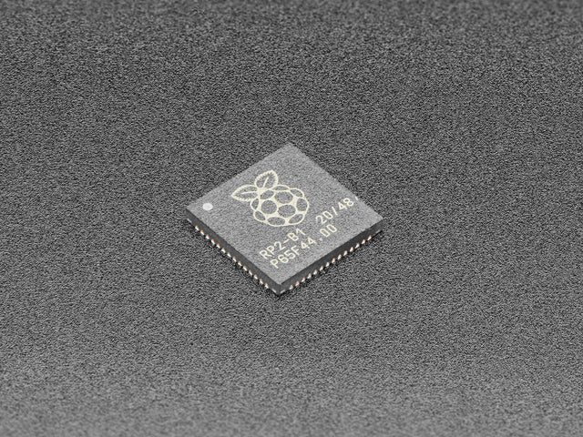 Angled shot of single RP2040 microchip.