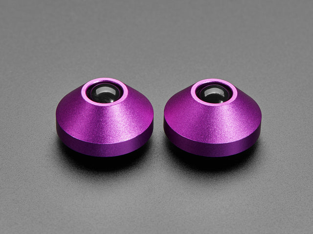 Angled shot of two purple aluminum bumper feet.