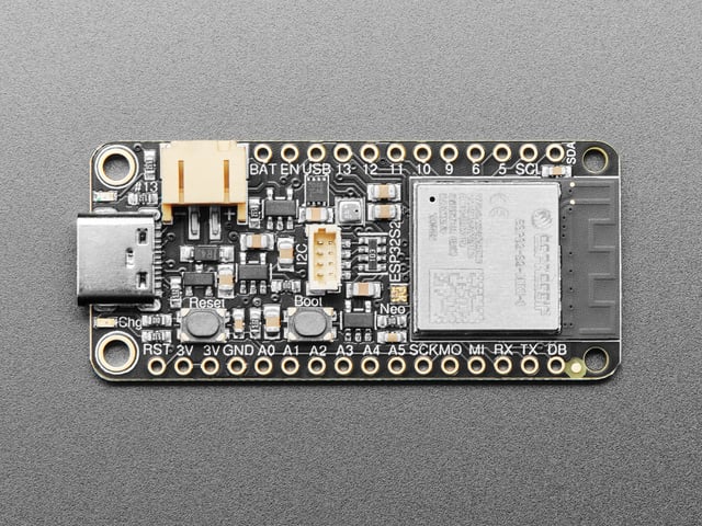 Angled view of rectangular microcontroller with WiFi module.