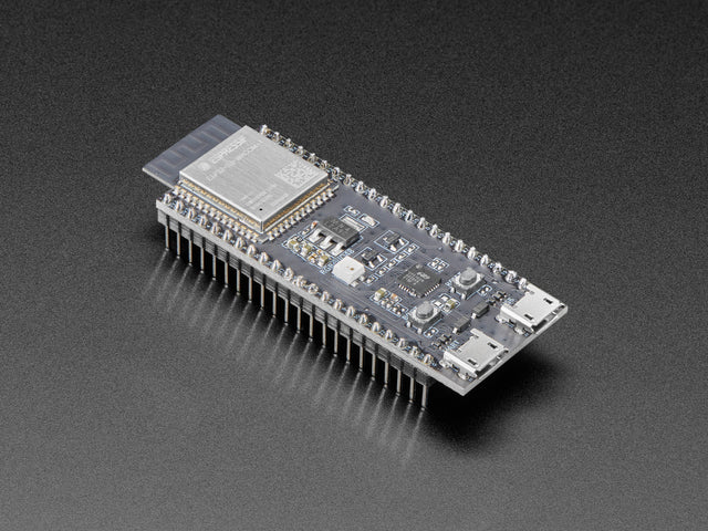 Angled shot of black rectangular microcontroller with a WIFI module.