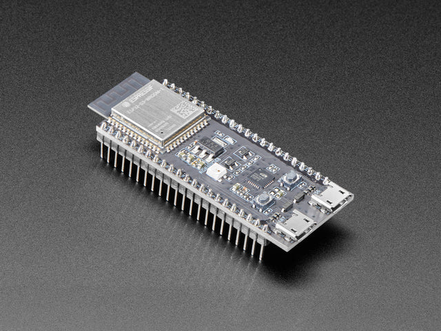 Angled shot of black rectangular microcontroller with a wifi module.