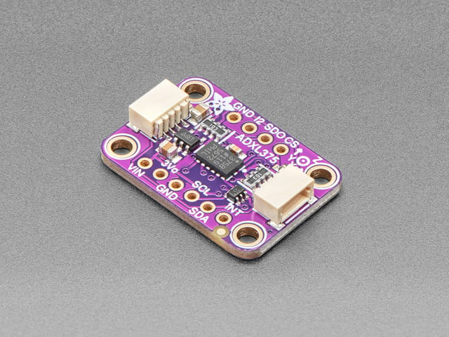 Angled shot of purple rectangular breakout board.