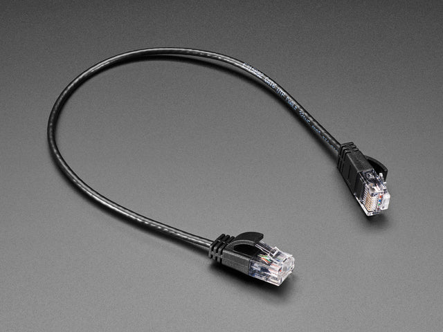 Angled shot of short skinny Ethernet cable.