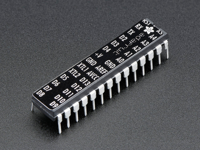 Angled shot of an Adafruit AVR Sticker for Breadboard Arduino-compatibles.