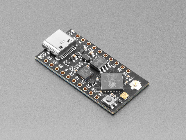 Angled shot of short black microcontroller.