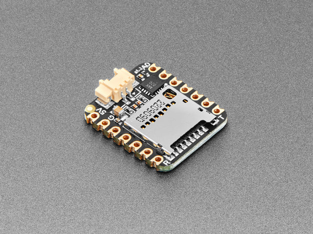 Angled shot of small square audio breakout board.