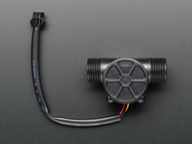 Liquid Flow Meter with two threaded inlets, and two-pin wire coming out